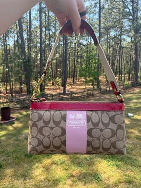 Coach Signature Canvas Wristlet in Beige with Pink Trim